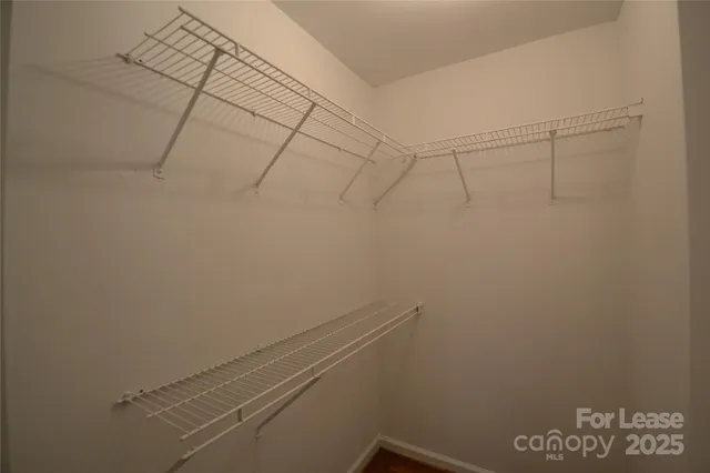 a view of a room with racks on the wall