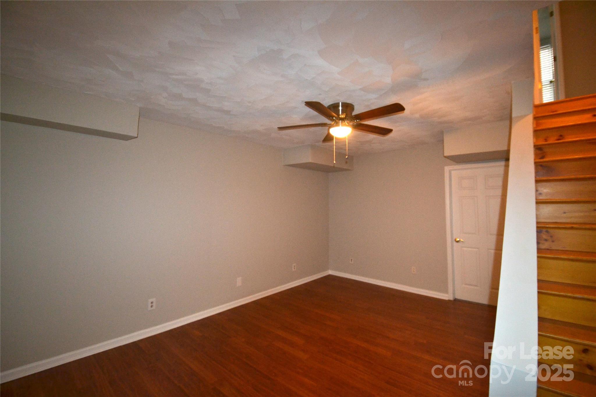9024 McElroy Road Waxhaw, NC 28173 - Photo 33 of 43 wooden floor in an empty room