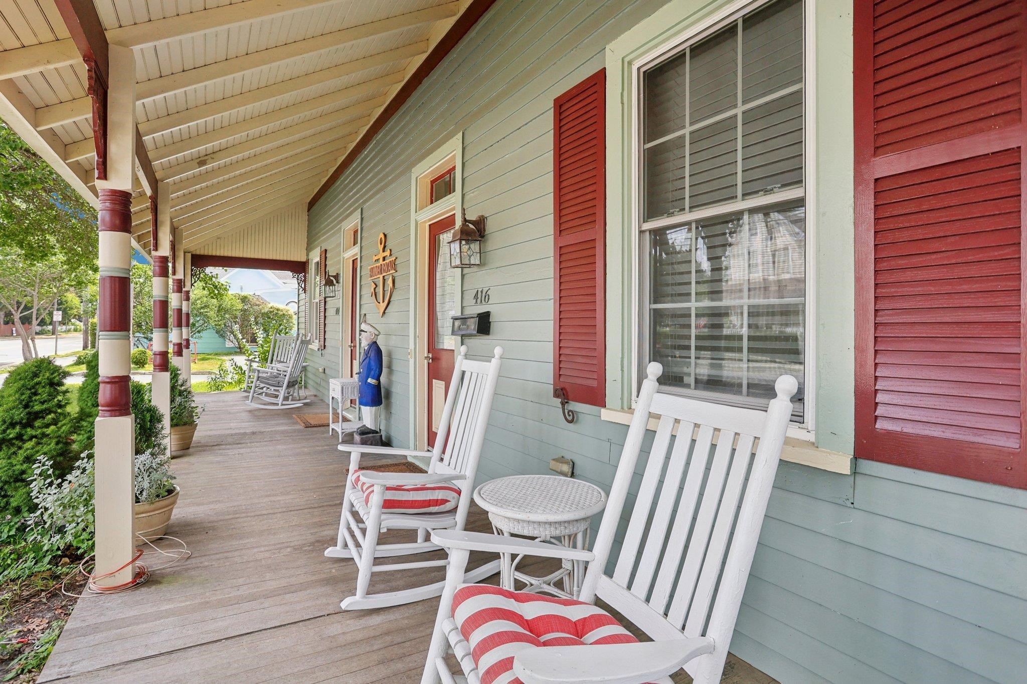 414 Broadway, Unit 414 West Cape May, NJ 08204 - Photo 23 of 48 a view of a balcony with chairs and wooden floor