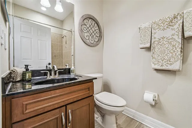 a room with furniture and a flat screen tv