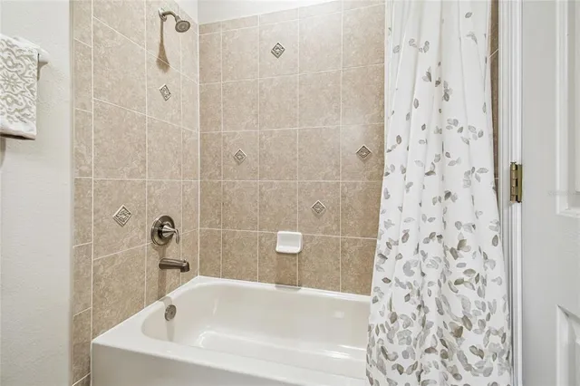 a view of living room with furniture and rug