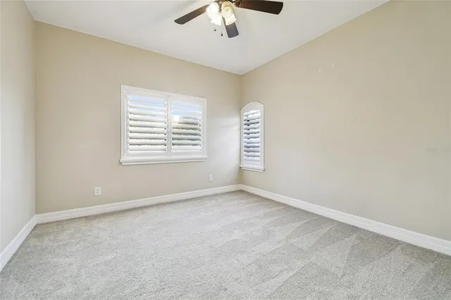 a view of a house with sitting area and garden