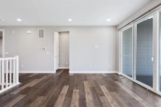 a view of livingroom with wooden floor