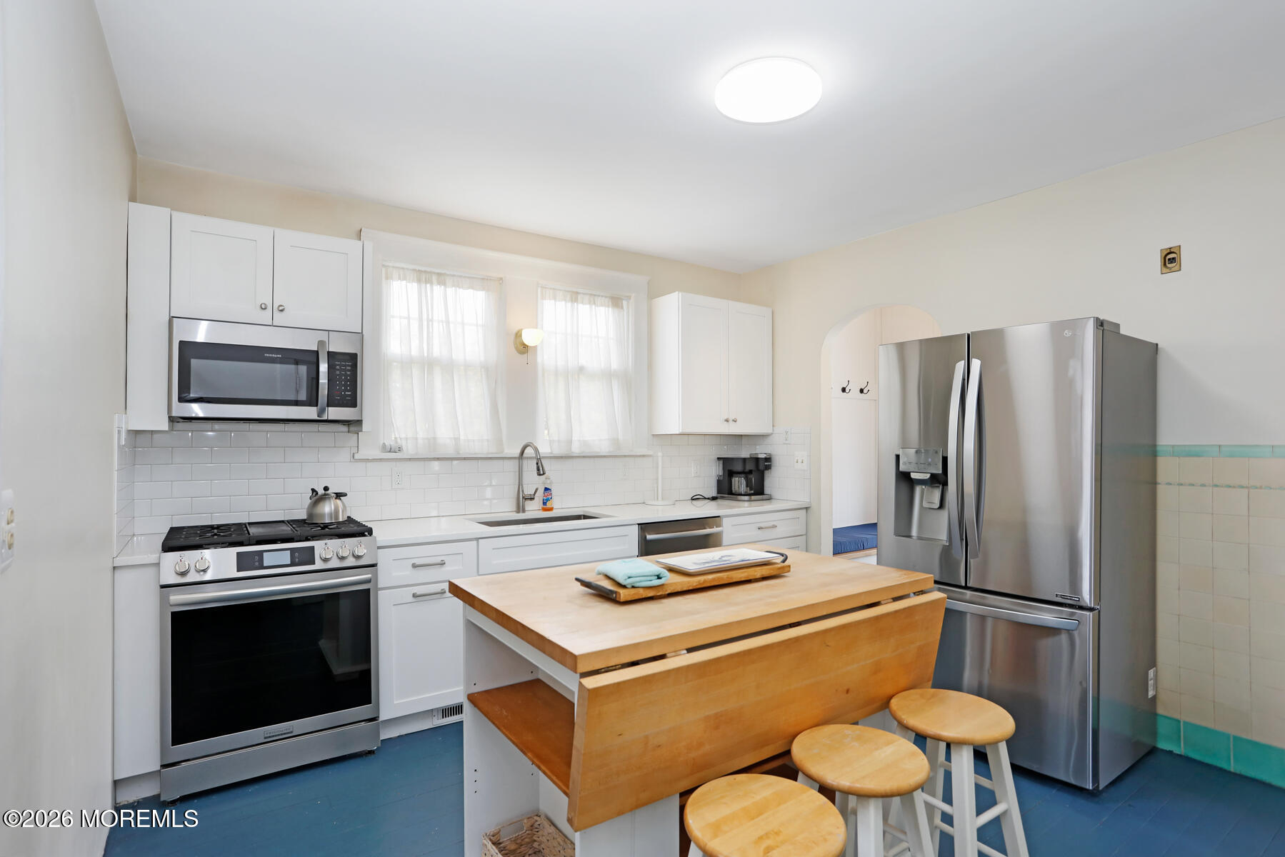 340 East Main Street Manasquan, NJ 08736 - Photo 21 of 46 a kitchen with a sink a stove a refrigerator and a microwave