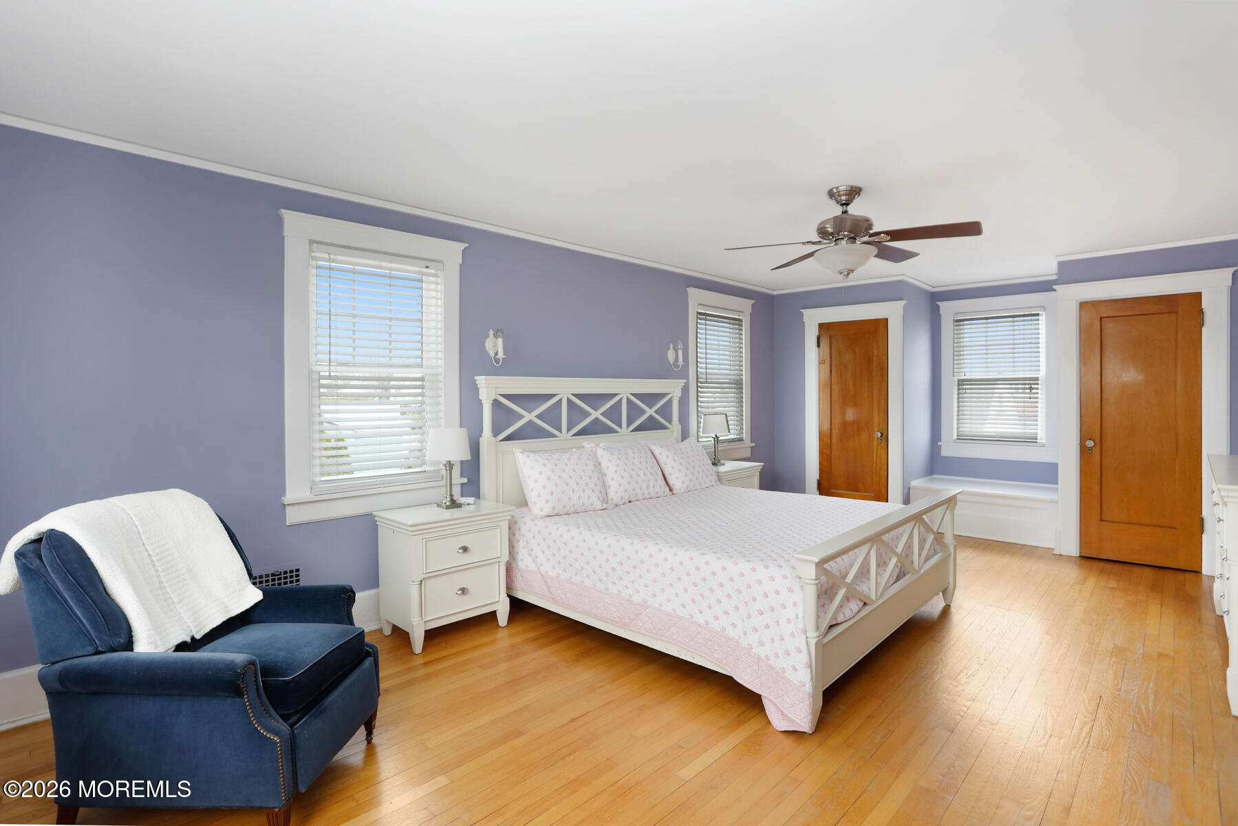 340 East Main Street Manasquan, NJ 08736 - Photo 29 of 46 a bedroom with a bed couch chair and glass door