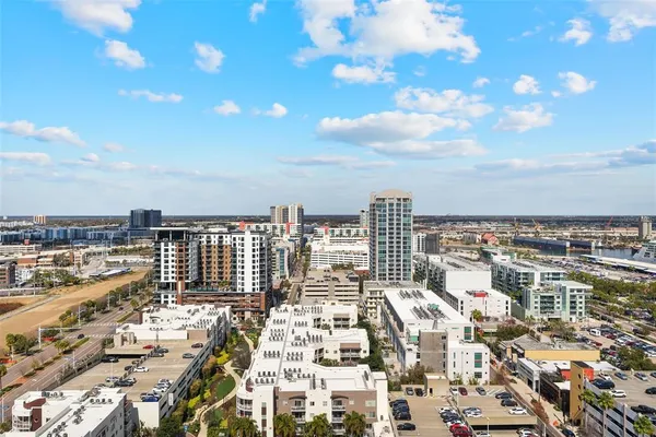 a view of a city with tall buildings