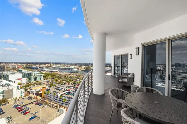 a view of a living room and kitchen