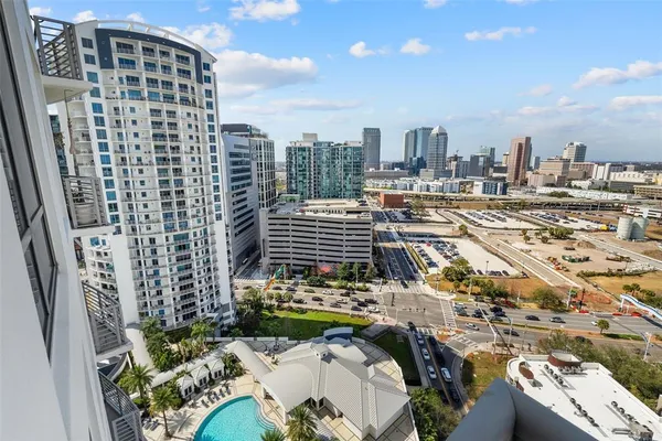 a view of a city with tall buildings