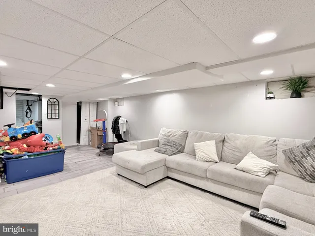 a living room with furniture and a couch