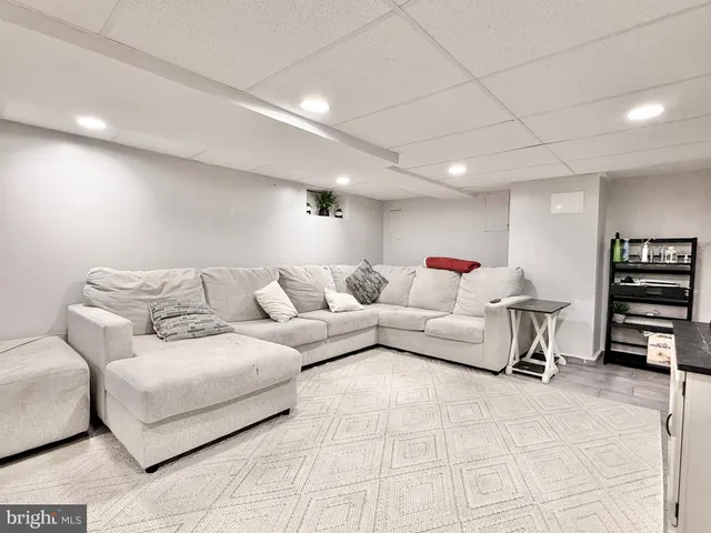 a living room with furniture and a couch