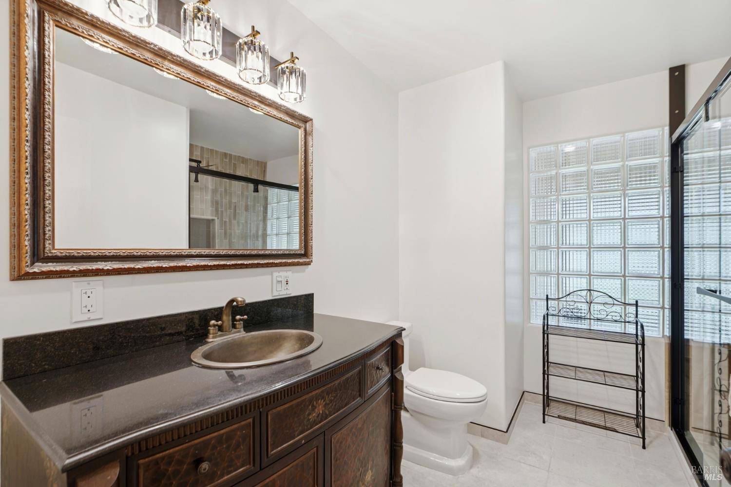 373 Piezzi Road Santa Rosa, CA 95401 - Photo 26 of 55 a bathroom with a sink toilet and shower