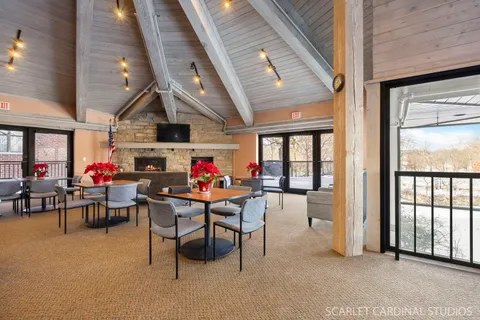 a view of a livingroom with furniture and window