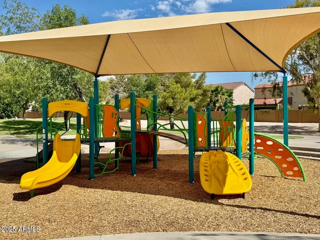 a view of a park with slide