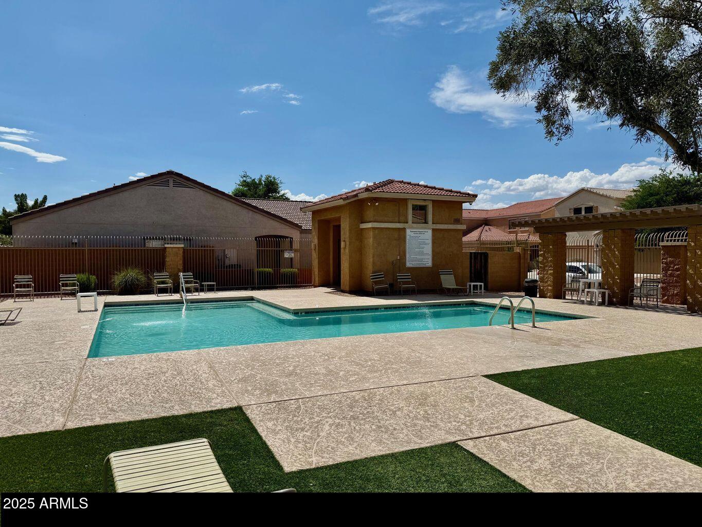 7014 West Mercer Lane Peoria, AZ 85345 - Photo 14 of 14 a front view of a house with a yard