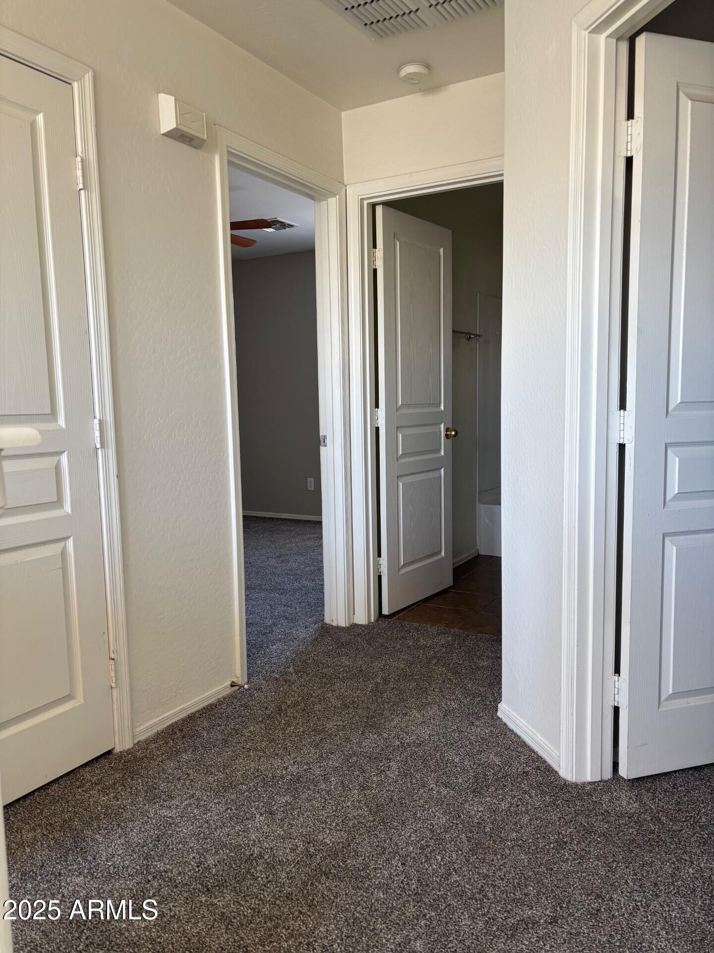 7014 West Mercer Lane Peoria, AZ 85345 - Photo 10 of 14 an empty room with closet