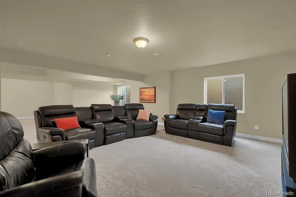 a living room with furniture and a couch