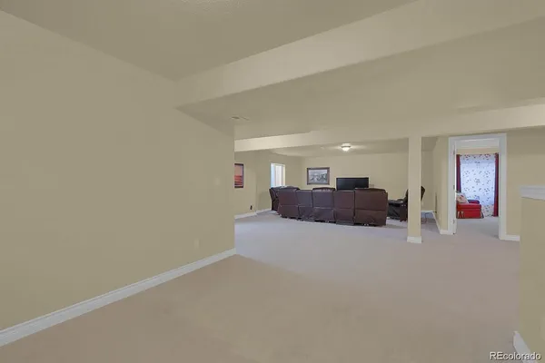 a large room with furniture and window