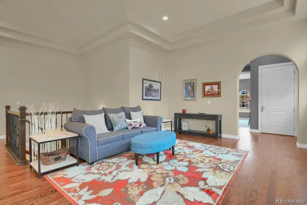 a living room with furniture and rug