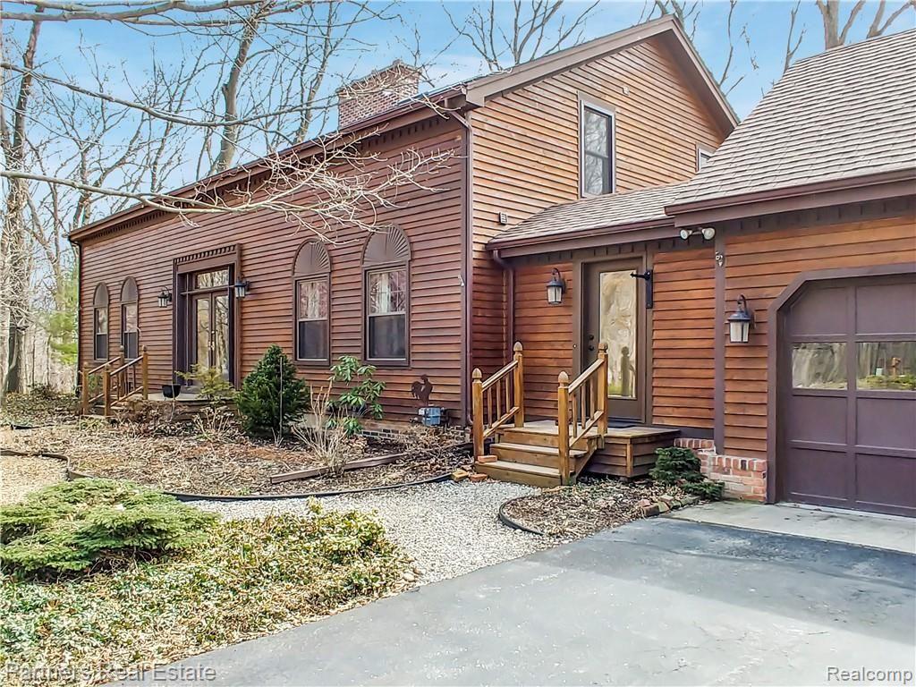 2715 West Coon Lake Road Howell, MI 48843 - Photo 1 of 54 1. Welcome Home to 2715 W Coon Lake Rd