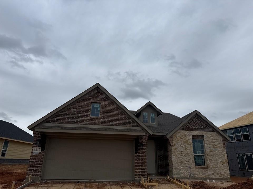 1217 Colca Drive Springtown, TX 76082 - Photo 2 of 9 a view of a house with wooden fence