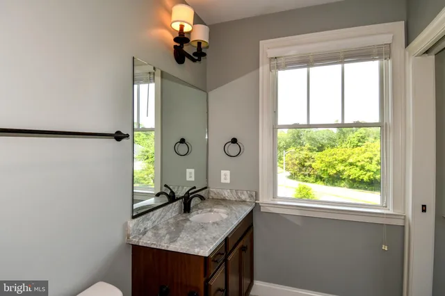 a bathroom with a shower and toilet