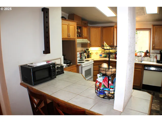 a view of storage utility and utility room