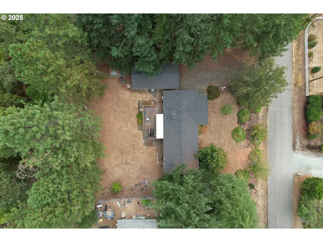 a view of a backyard of a house
