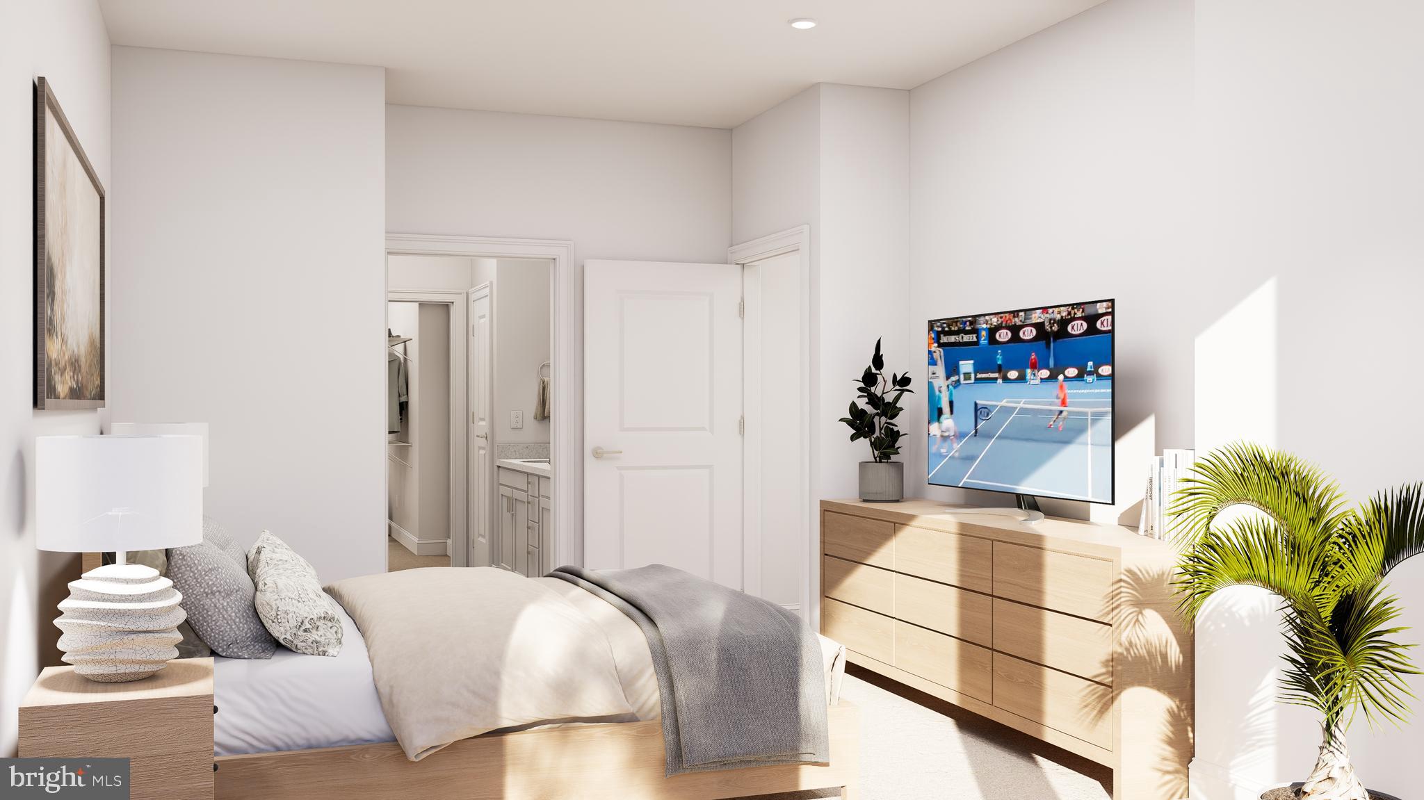 83 Bethlehem Pike, Unit 1306 Colmar, PA 18915 - Photo 11 of 19 a bedroom with a bed and a painting on the wall