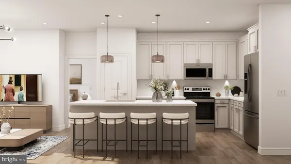 a kitchen with a stove a sink and a refrigerator