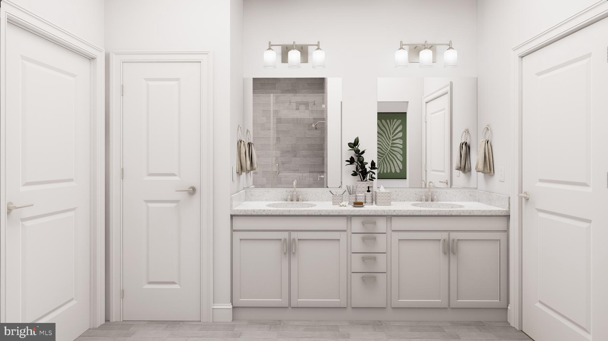 83 Bethlehem Pike, Unit 1306 Colmar, PA 18915 - Photo 8 of 19 a bathroom with a double vanity sink and mirror