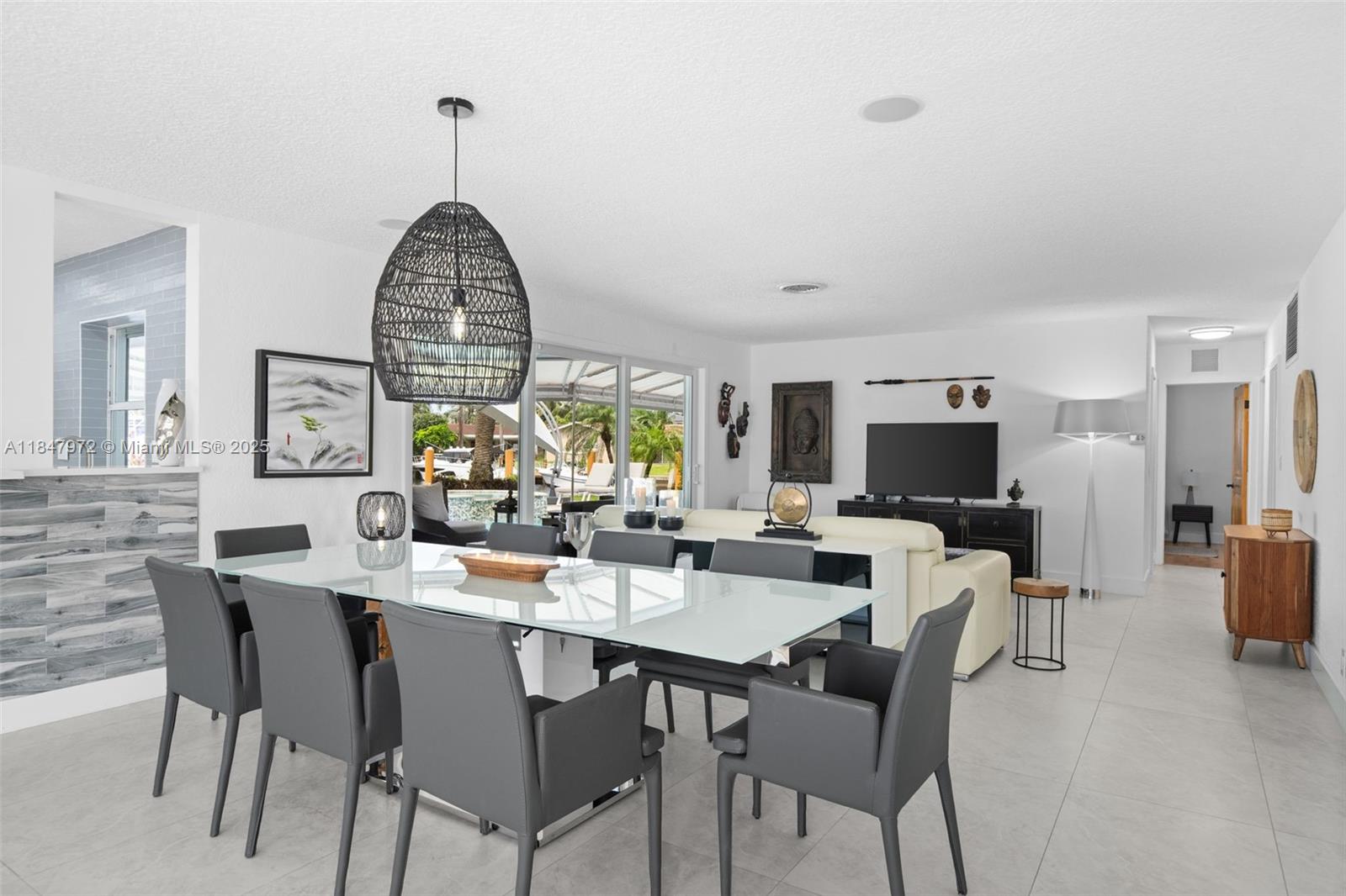 2681 Northeast 9th Court Pompano Beach, FL 33062 - Photo 11 of 58 a view of a dining room with furniture