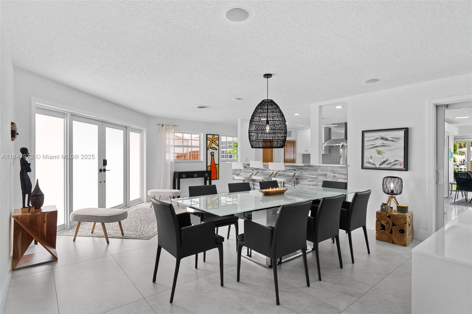 2681 Northeast 9th Court Pompano Beach, FL 33062 - Photo 14 of 58 a view of a dining room with furniture window and outside view