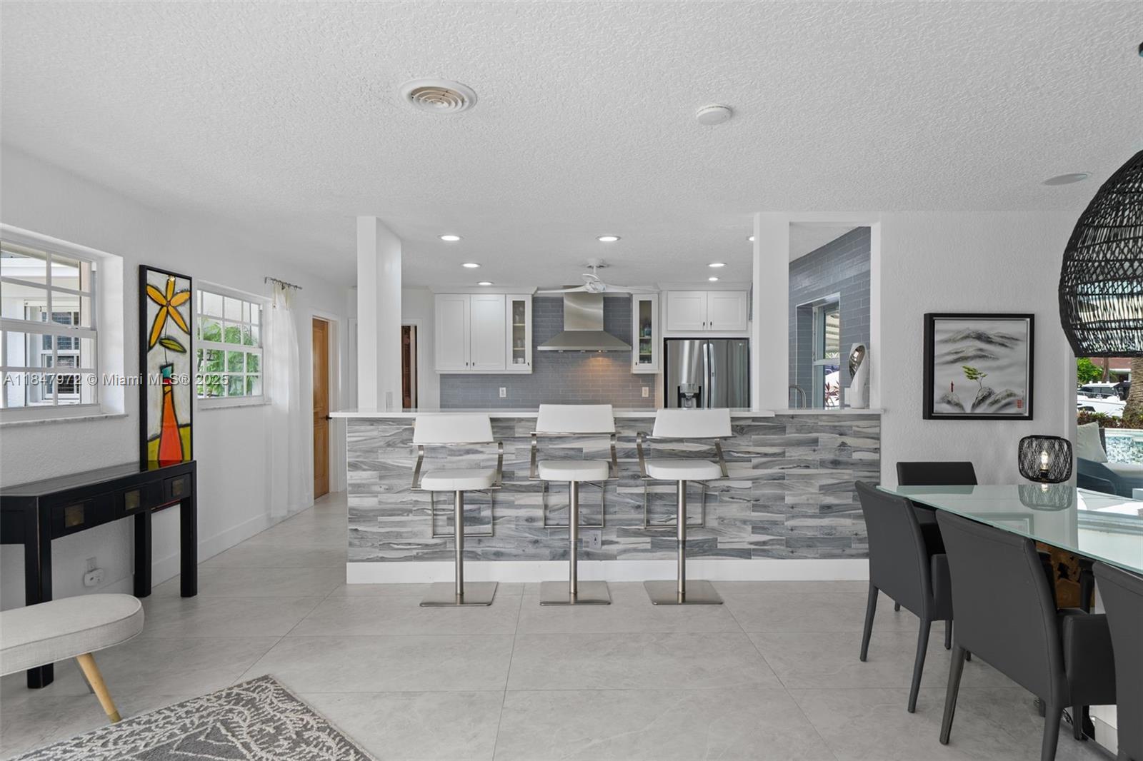 2681 Northeast 9th Court Pompano Beach, FL 33062 - Photo 15 of 58 a view of a dining room with furniture