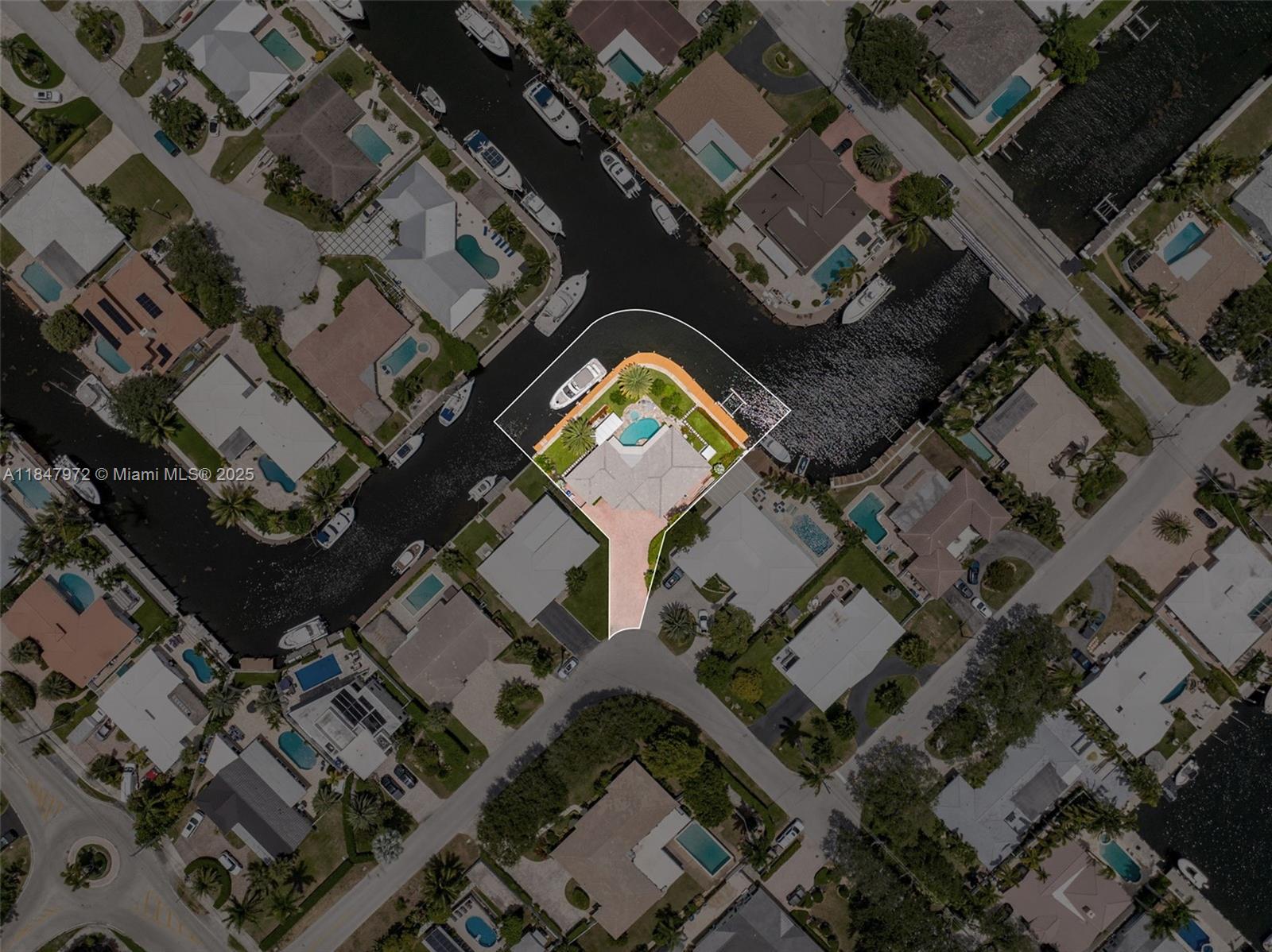 2681 Northeast 9th Court Pompano Beach, FL 33062 - Photo 49 of 58 an aerial view of a house with swimming pool