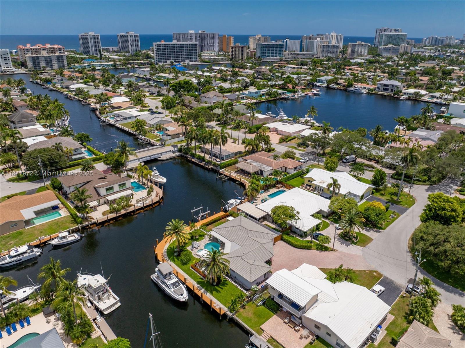 2681 Northeast 9th Court Pompano Beach, FL 33062 - Photo 52 of 58 an aerial view of residential houses with outdoor space