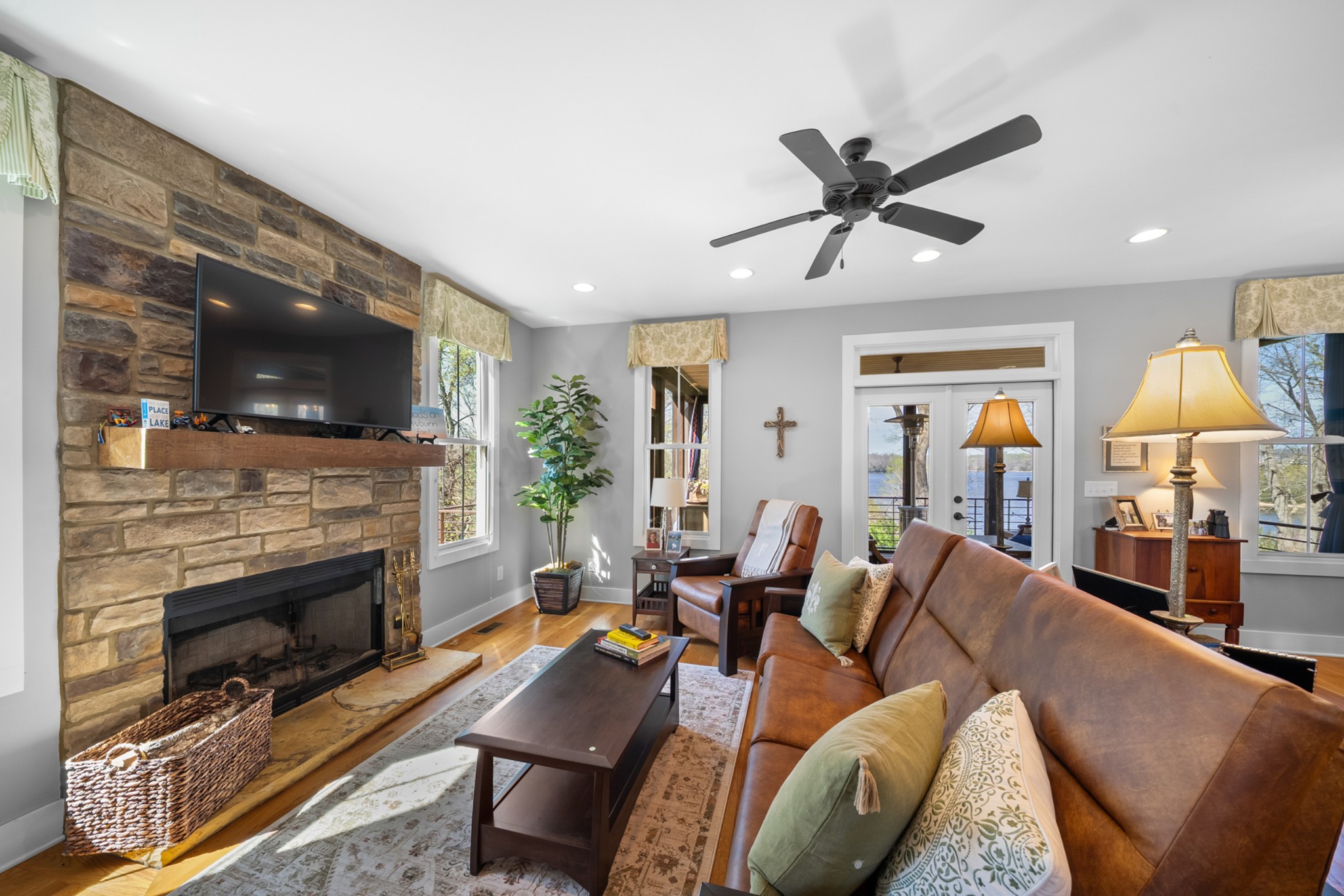 369 Fanning Bend Drive Winchester, TN 37398 - Photo 11 of 54 a living room with furniture a fireplace and a flat screen tv