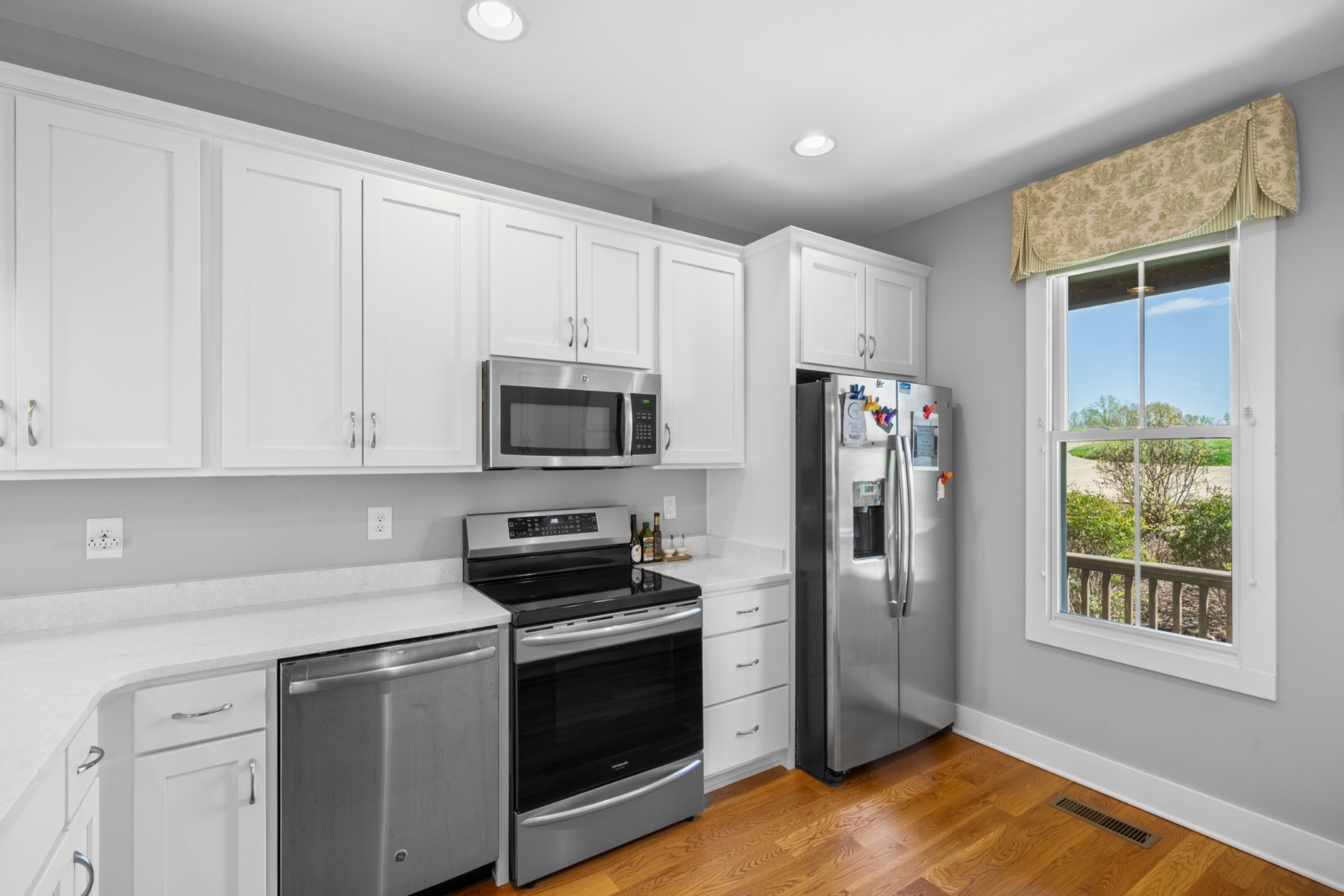 369 Fanning Bend Drive Winchester, TN 37398 - Photo 16 of 54 a kitchen with stainless steel appliances granite countertop a refrigerator sink and microwave