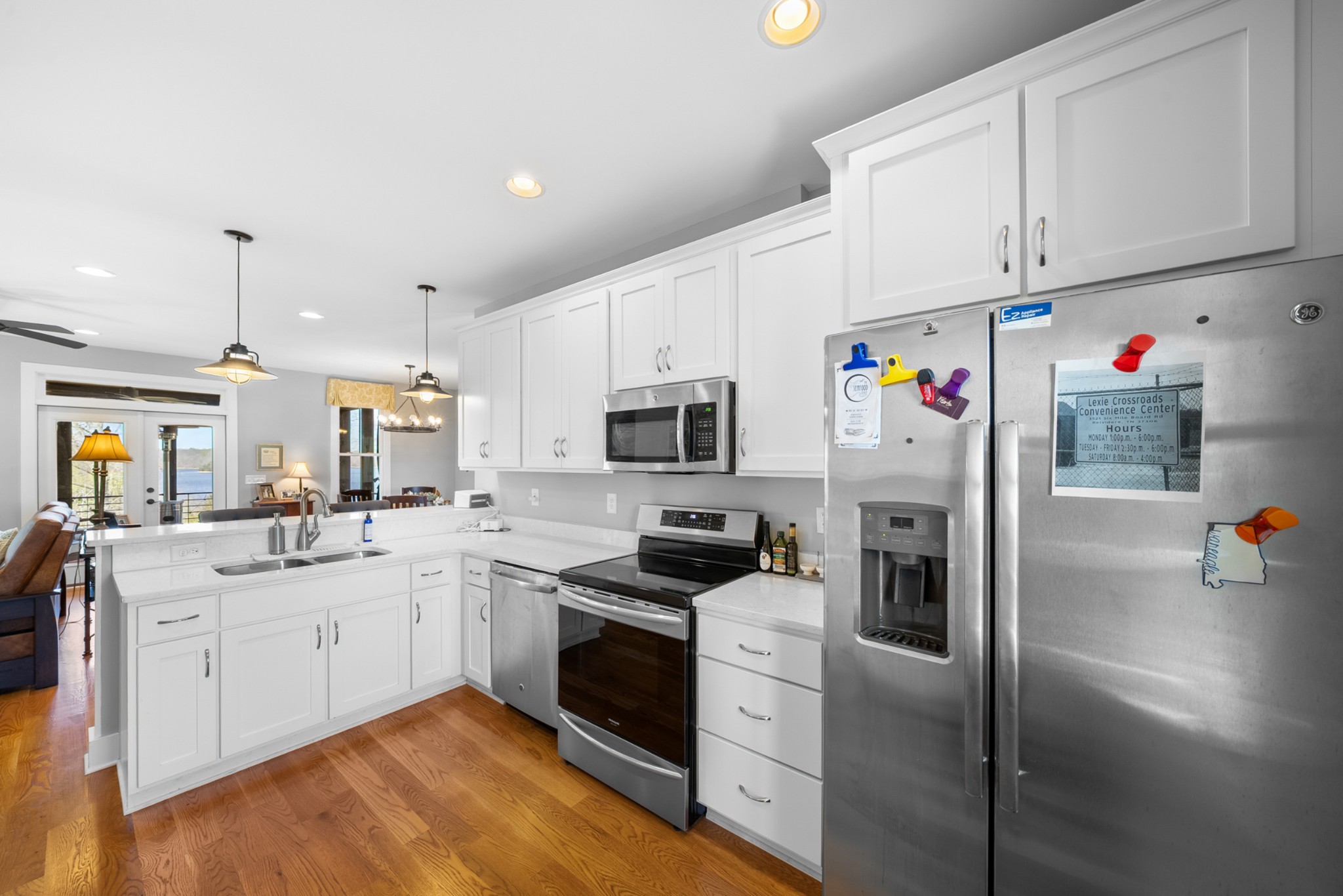 369 Fanning Bend Drive Winchester, TN 37398 - Photo 18 of 54 a kitchen that has a lot of white cabinets and stainless steel appliances