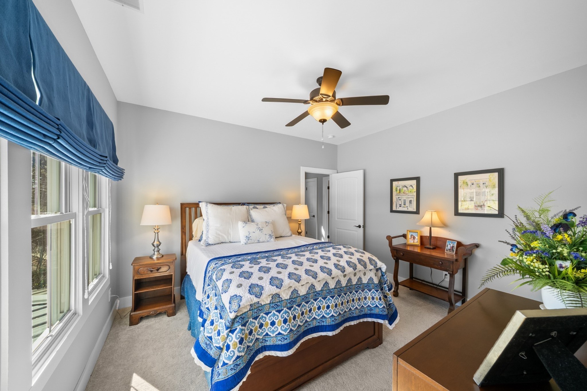 369 Fanning Bend Drive Winchester, TN 37398 - Photo 26 of 54 a bedroom with a bed and a chandelier