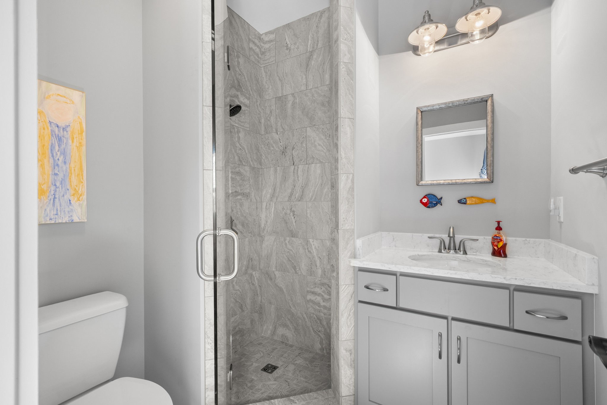 369 Fanning Bend Drive Winchester, TN 37398 - Photo 27 of 54 a bathroom with a sink toilet vanity and shower