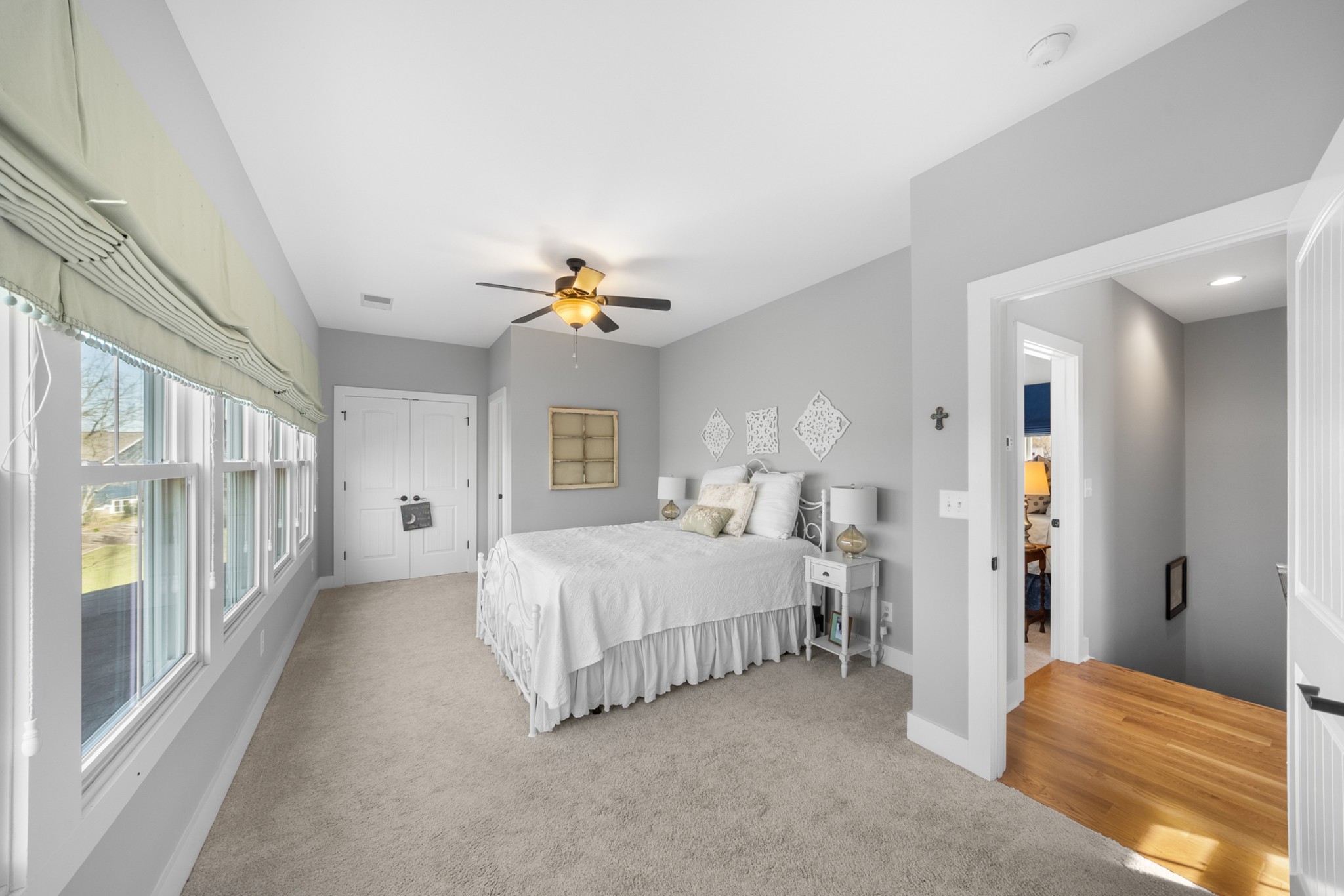 369 Fanning Bend Drive Winchester, TN 37398 - Photo 29 of 54 a bedroom with a bed and a chandelier