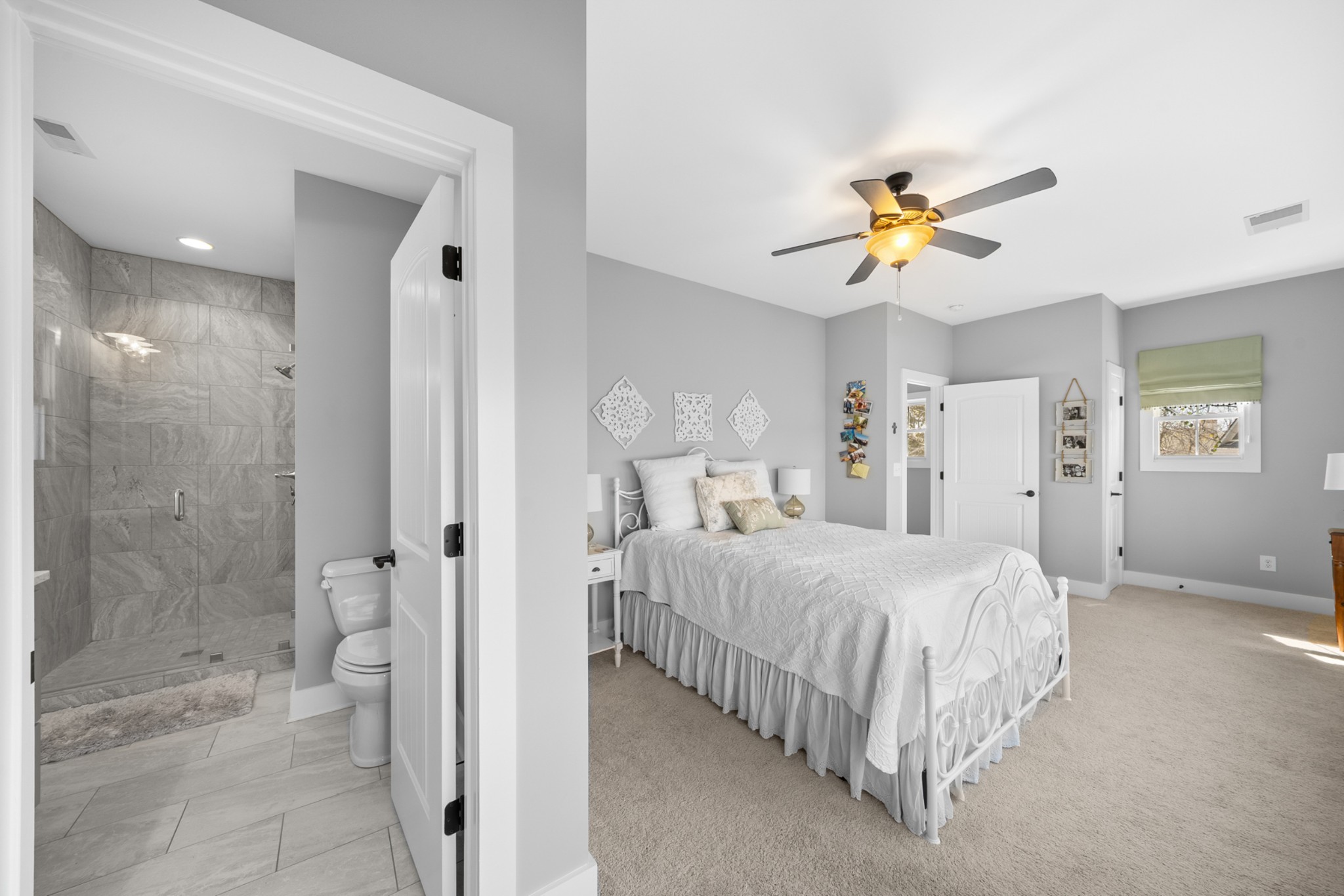 369 Fanning Bend Drive Winchester, TN 37398 - Photo 30 of 54 a bedroom with a bed and a chandelier