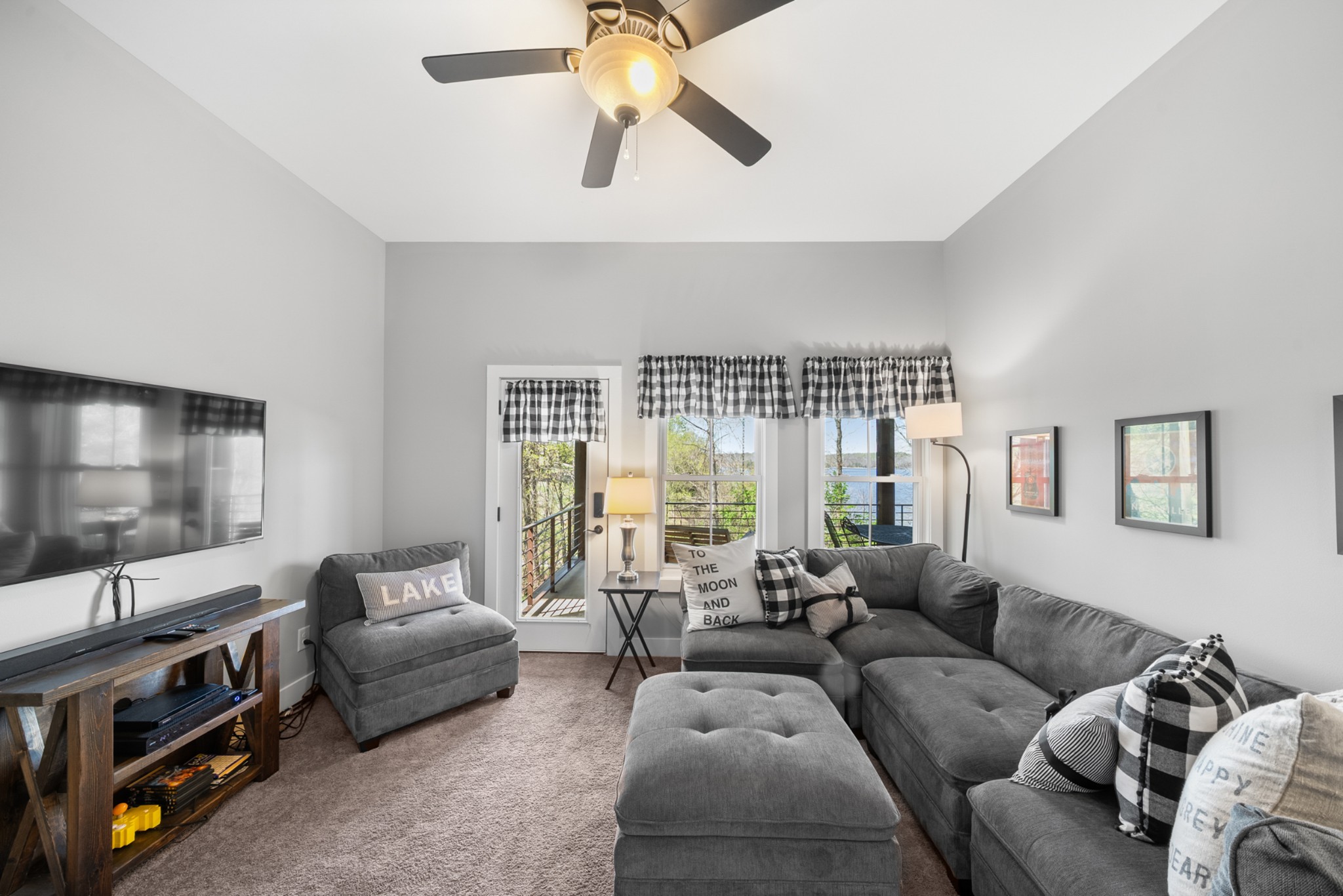 369 Fanning Bend Drive Winchester, TN 37398 - Photo 35 of 54 a living room with furniture and a flat screen tv