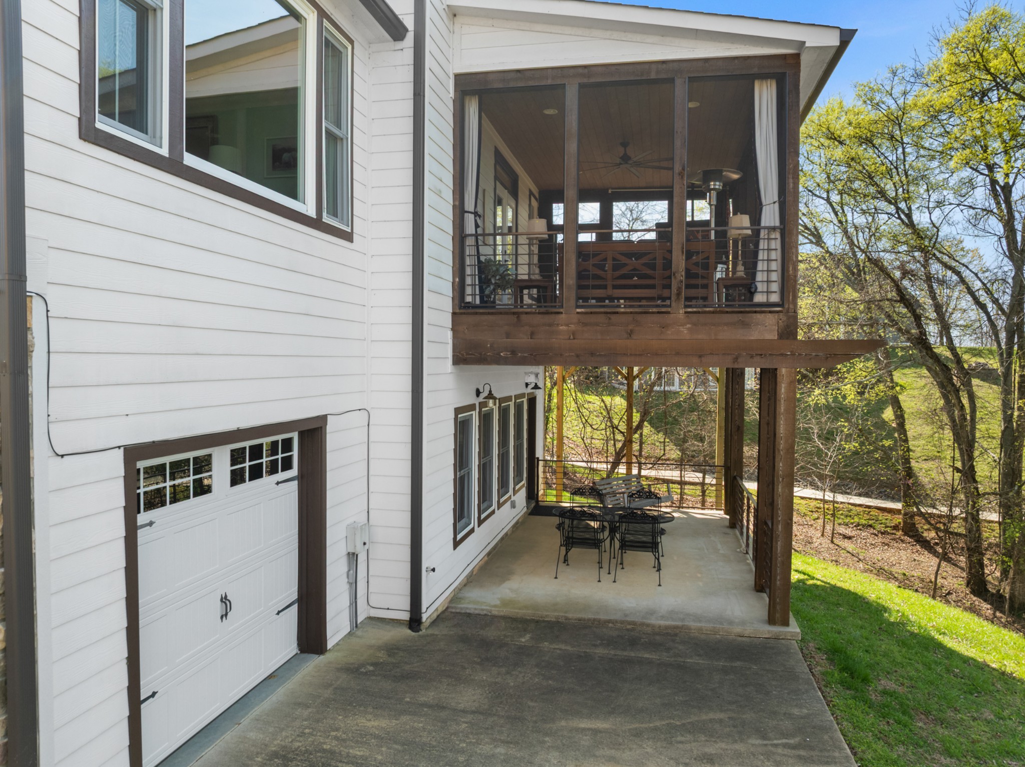 369 Fanning Bend Drive Winchester, TN 37398 - Photo 49 of 54 a view of a patio with table and chairs and floor to ceiling window
