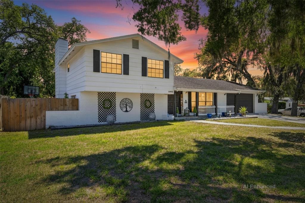 6609 Jennifer Drive Temple Terrace, FL 33617 - Photo 1 of 49 a front view of house with yard and green space