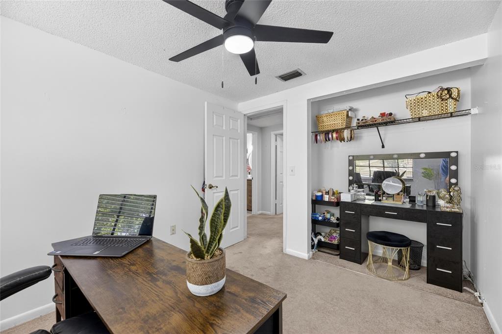 6609 Jennifer Drive Temple Terrace, FL 33617 - Photo 31 of 49 a dining room with furniture and chandelier