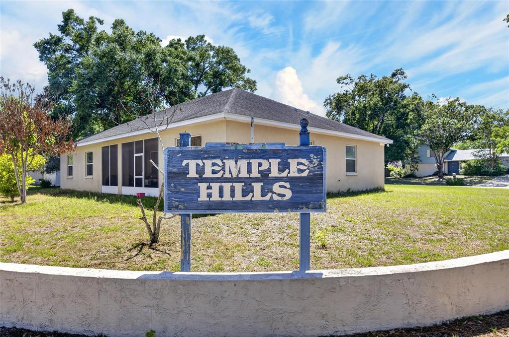 6609 Jennifer Drive Temple Terrace, FL 33617 - Photo 49 of 49 a sign on the side of a road