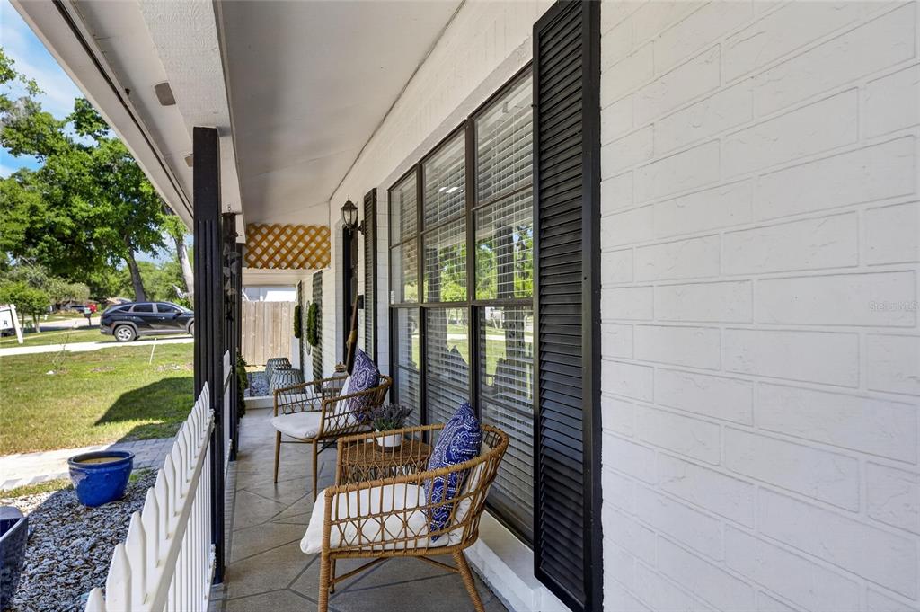 6609 Jennifer Drive Temple Terrace, FL 33617 - Photo 7 of 49 a view of balcony with a patio and dining space