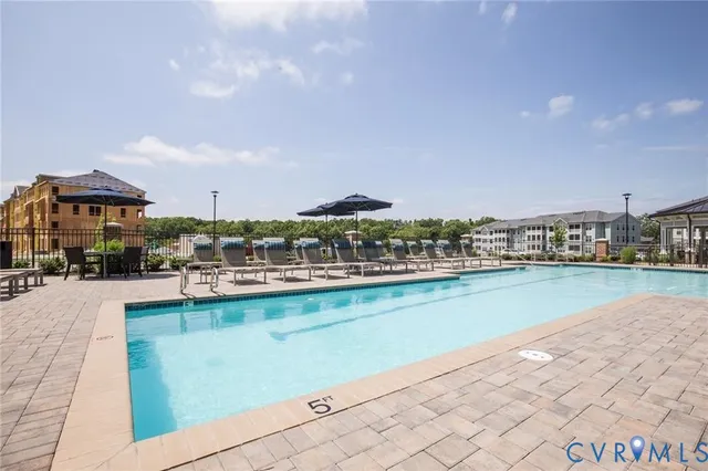 a view of a city with lawn chairs