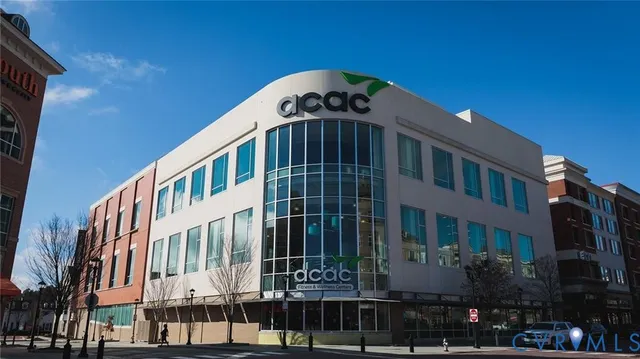 a view of swimming pool with outdoor seating